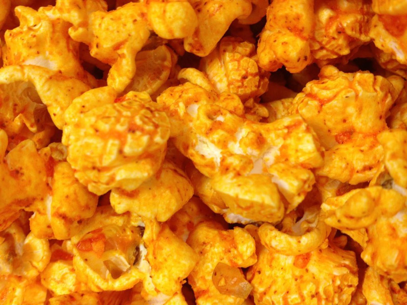 Order SPICY CHEESE food online from Poparazzis Popcorn store, Houston on bringmethat.com