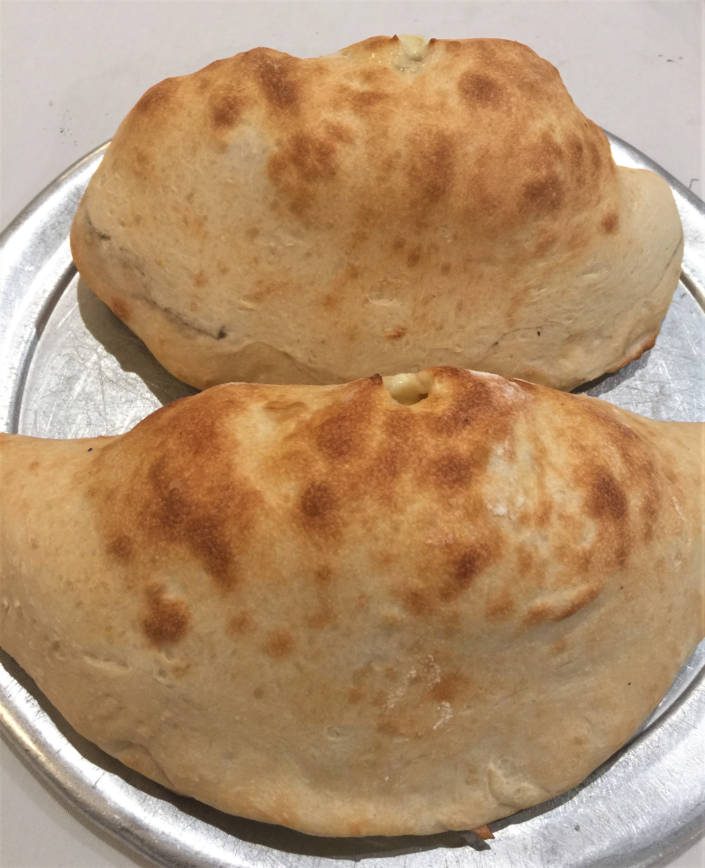 Order Cheese Calzone food online from Vincent Pizzeria store, Albertson on bringmethat.com