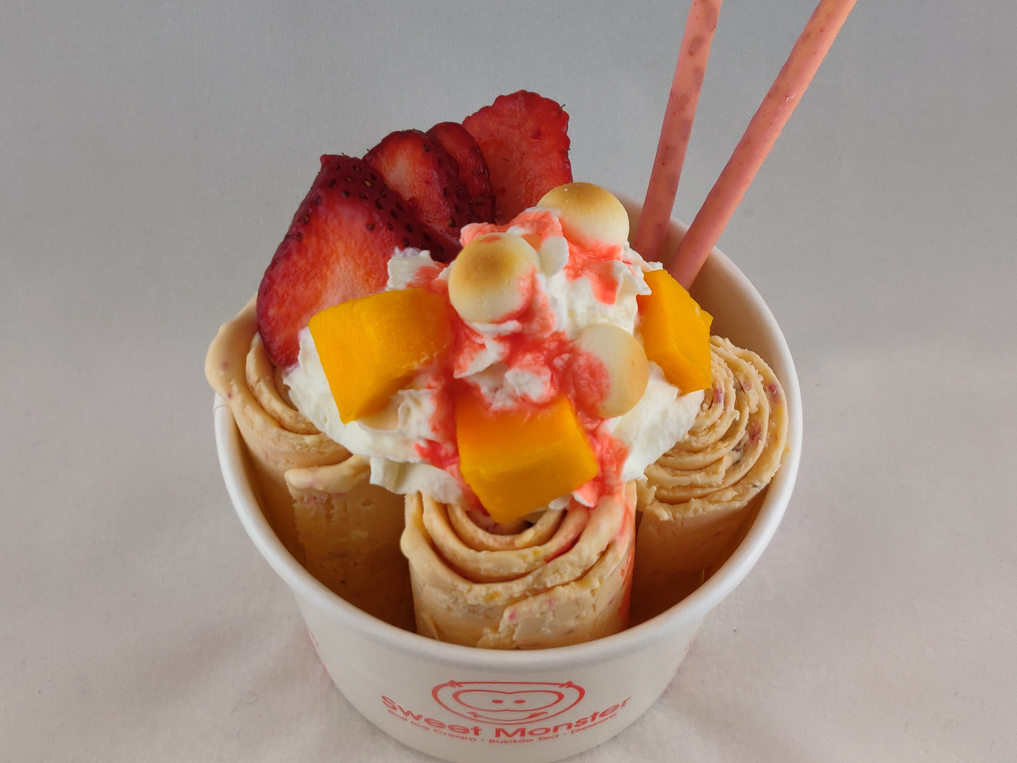 Order Tropical Sunset (Mango Strawberry) food online from Sweet Monster store, Oak Park on bringmethat.com