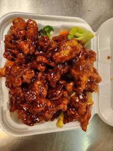 Order 311. Orange Chicken food online from Pearl Chinese Restaurant store, Mesquite on bringmethat.com