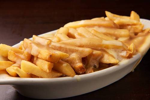 Order Poutine-Disco Fries food online from Mocha Bleu store, Teaneck on bringmethat.com