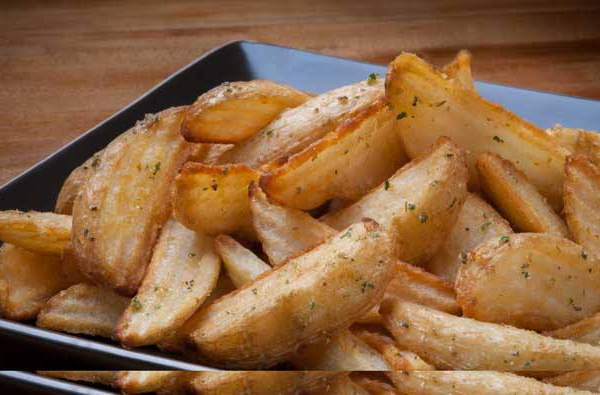 Order 1 lb. Potato Wedges food online from LA Pizza store, Panorama City on bringmethat.com