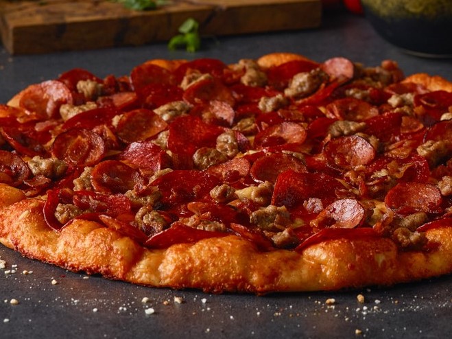 Order Ulti-Meat Pizza food online from Round Table Pizza store, San Clemente on bringmethat.com