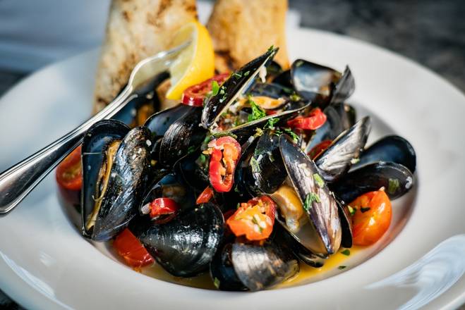Order Spicy Mussels food online from The Boathouse at Short Pump store, Richmond on bringmethat.com