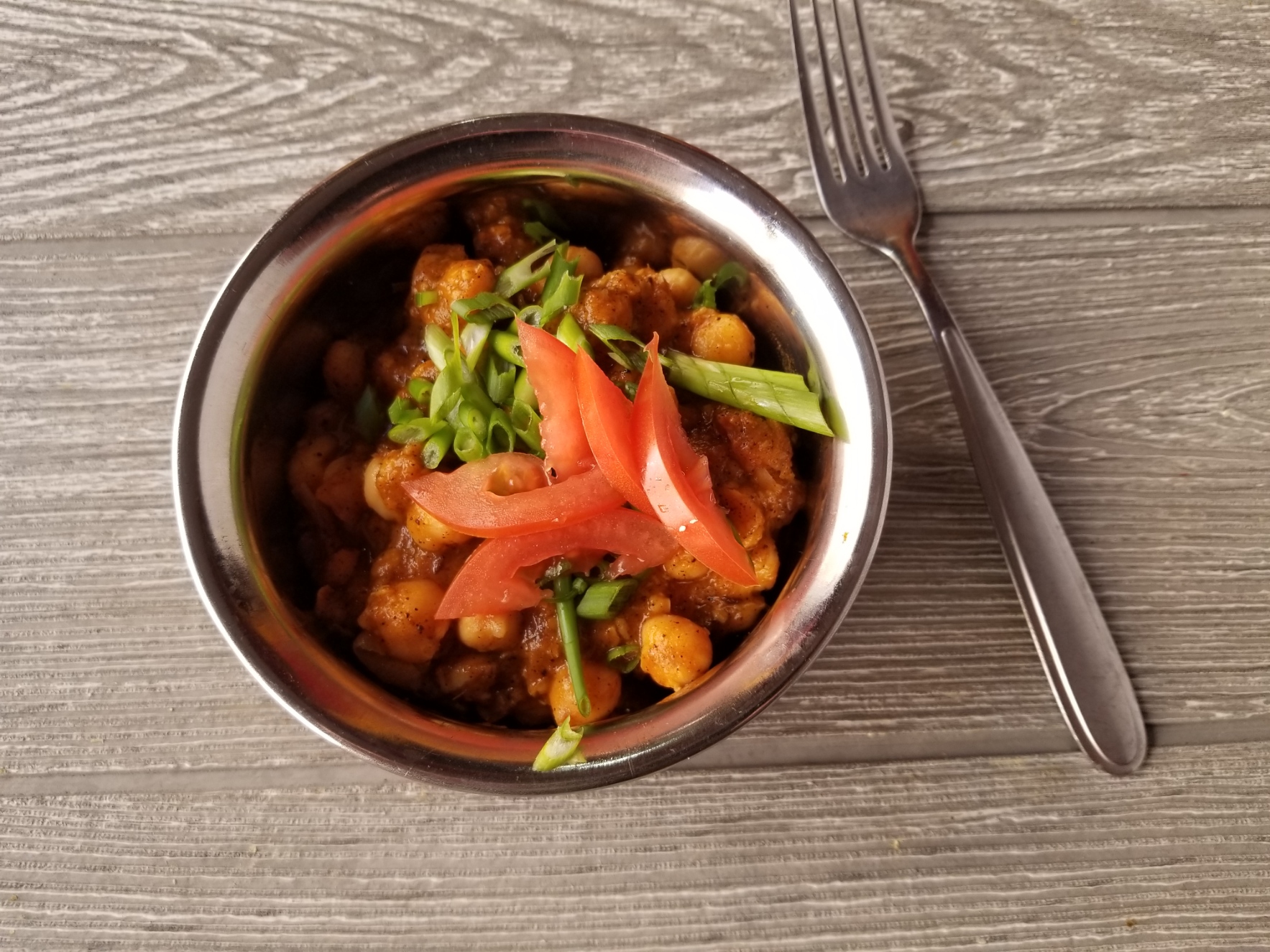 Order Vegan Chana Masala food online from Indian Kitchen Lovash store, Philadelphia on bringmethat.com