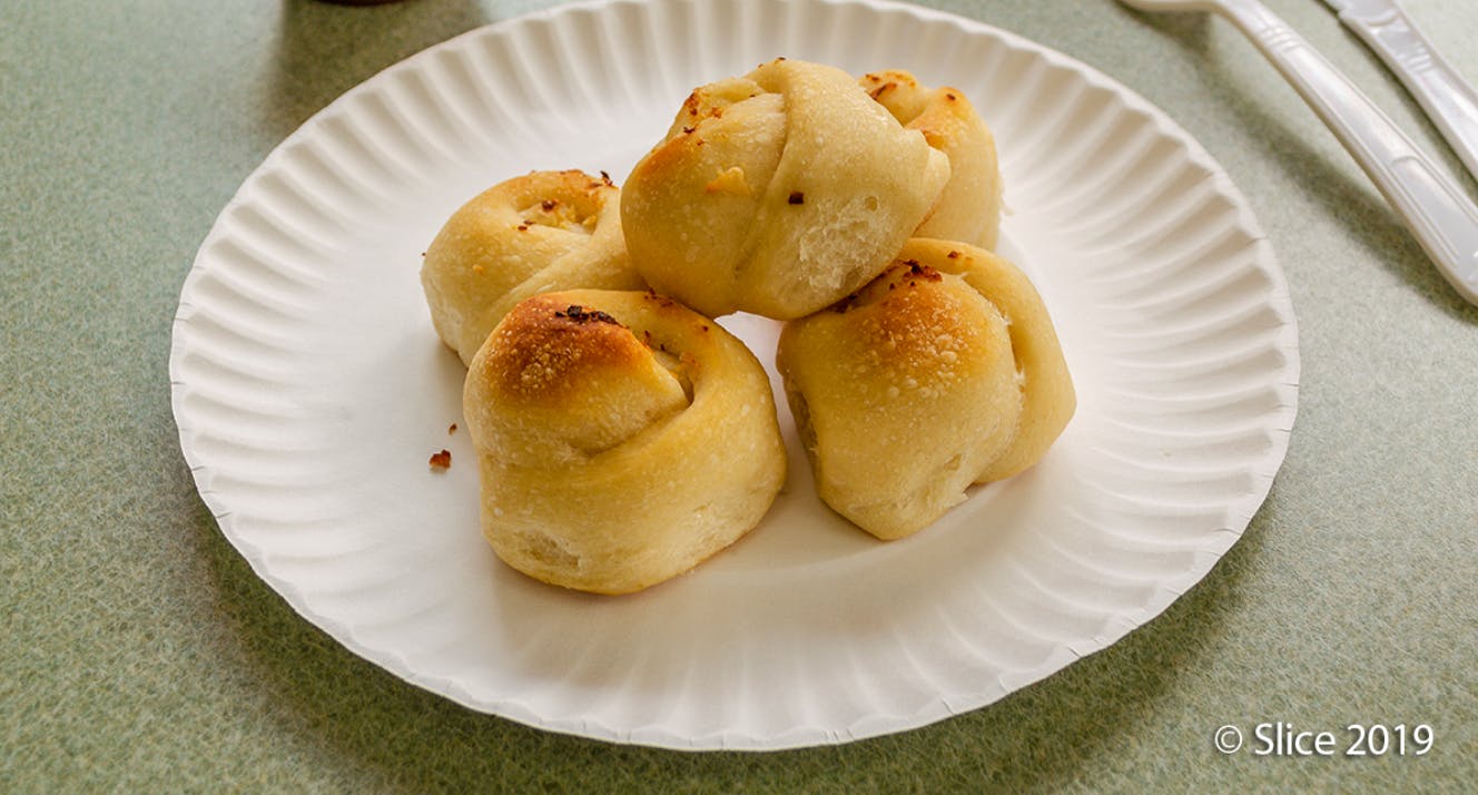 Order Garlic Knots - 6 Pieces food online from Scarsdale Pizza Station store, Scarsdale on bringmethat.com