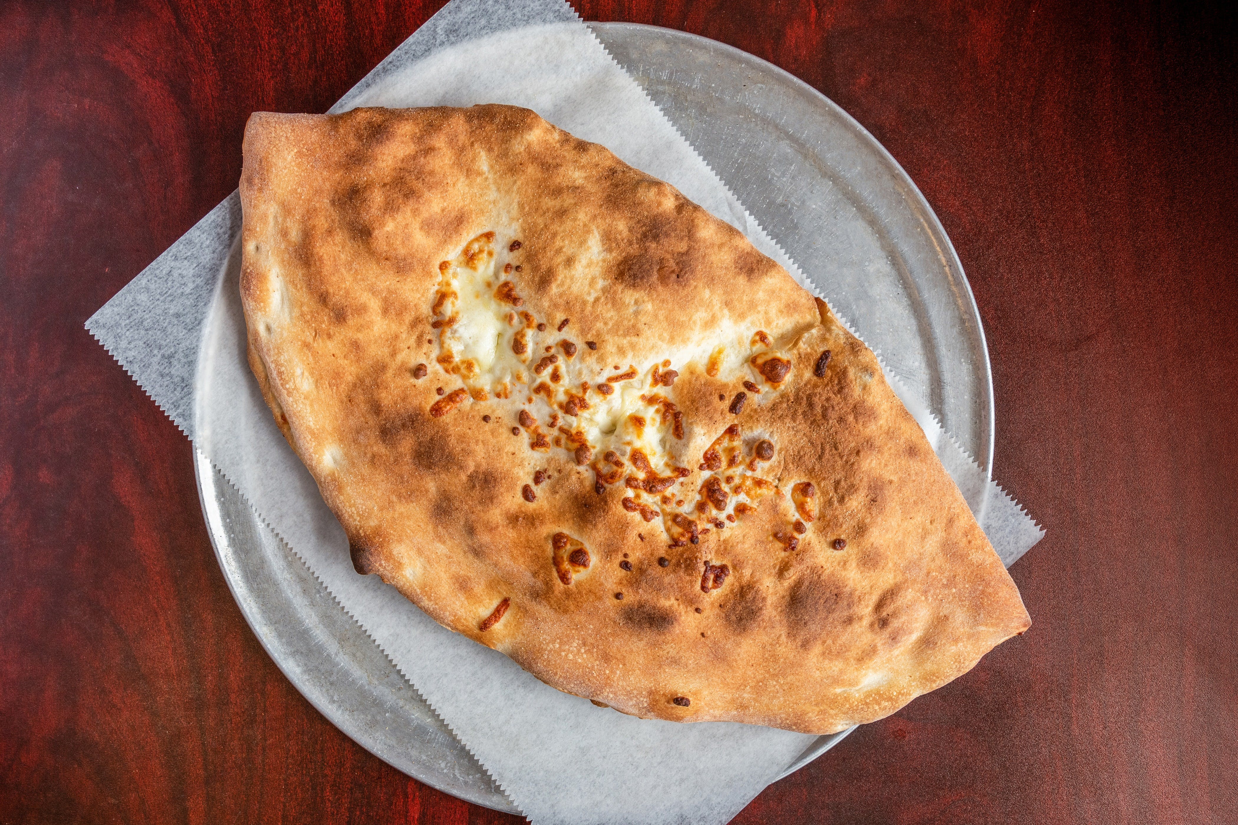 Order Buffalo Chicken Calzone - Calzone food online from Pizzeria 260 store, Boston on bringmethat.com