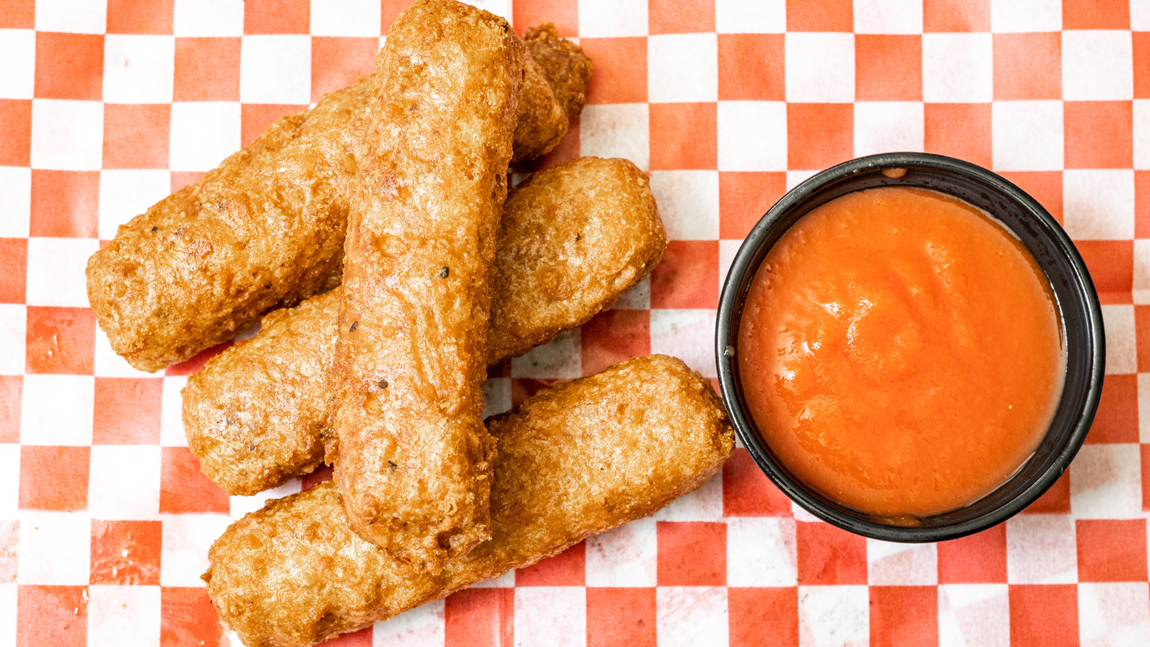 Order Side of (4) Mozzarella Sticks food online from Munch Hut Deli & Store store, Athens on bringmethat.com