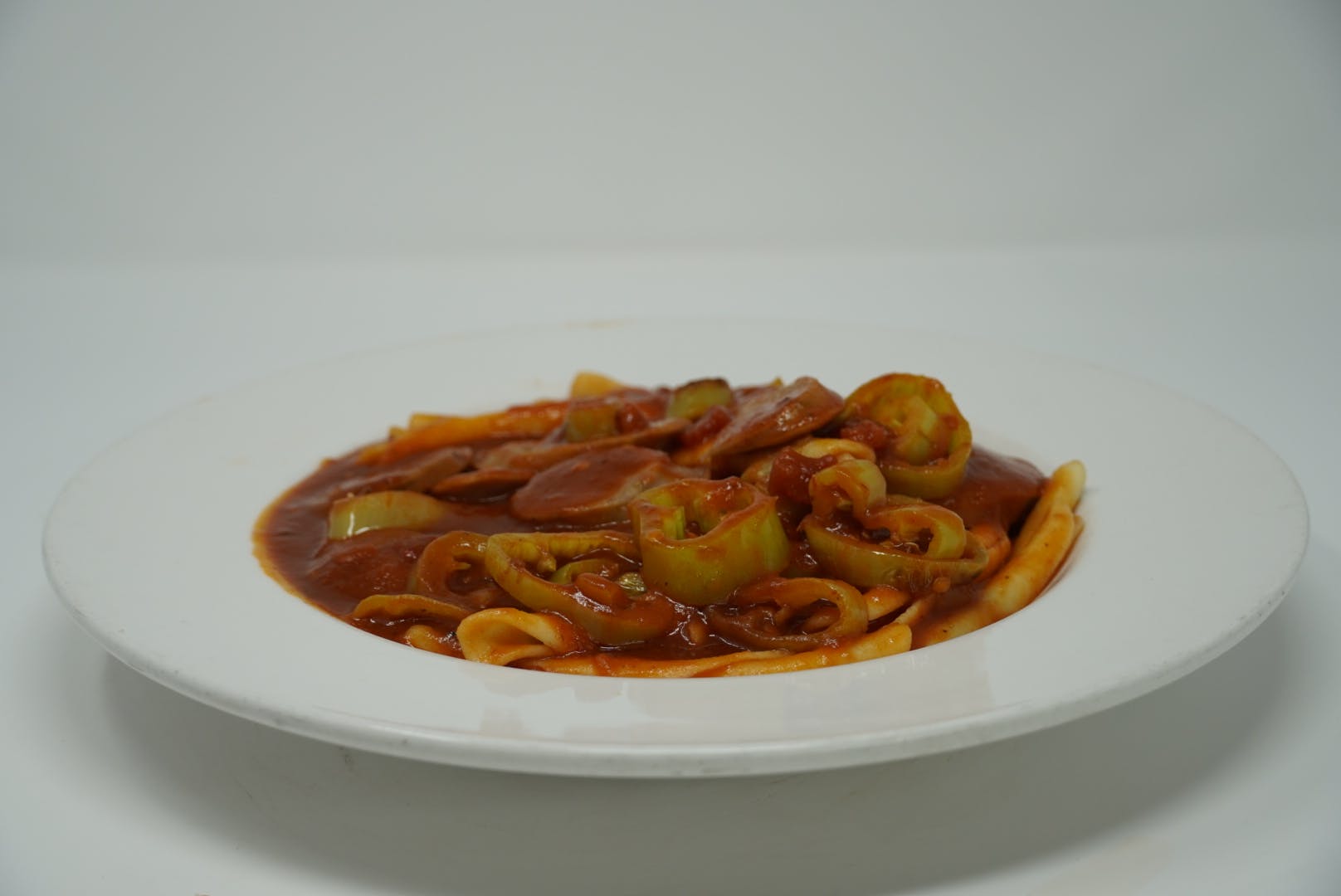 Order Spicy Strozzapretti - Pasta food online from DeNunzio's Italian Restaurant - Latrobe store, Latrobe on bringmethat.com