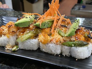 Order Baked Scallop Roll food online from Aki Sushi & Japanese Fusion store, San Jacinto on bringmethat.com
