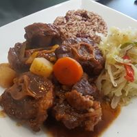 Order Oxtails food online from Ava Island Cafe store, Leavenworth on bringmethat.com