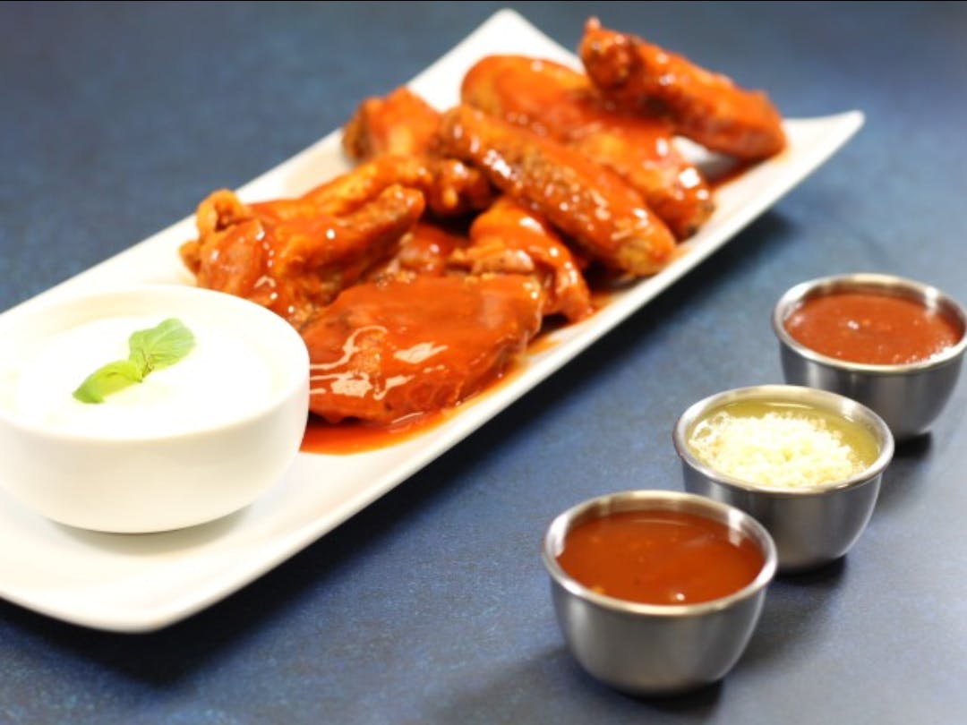 Order Wings - 7 pieces food online from Pizza Seven store, Houston on bringmethat.com