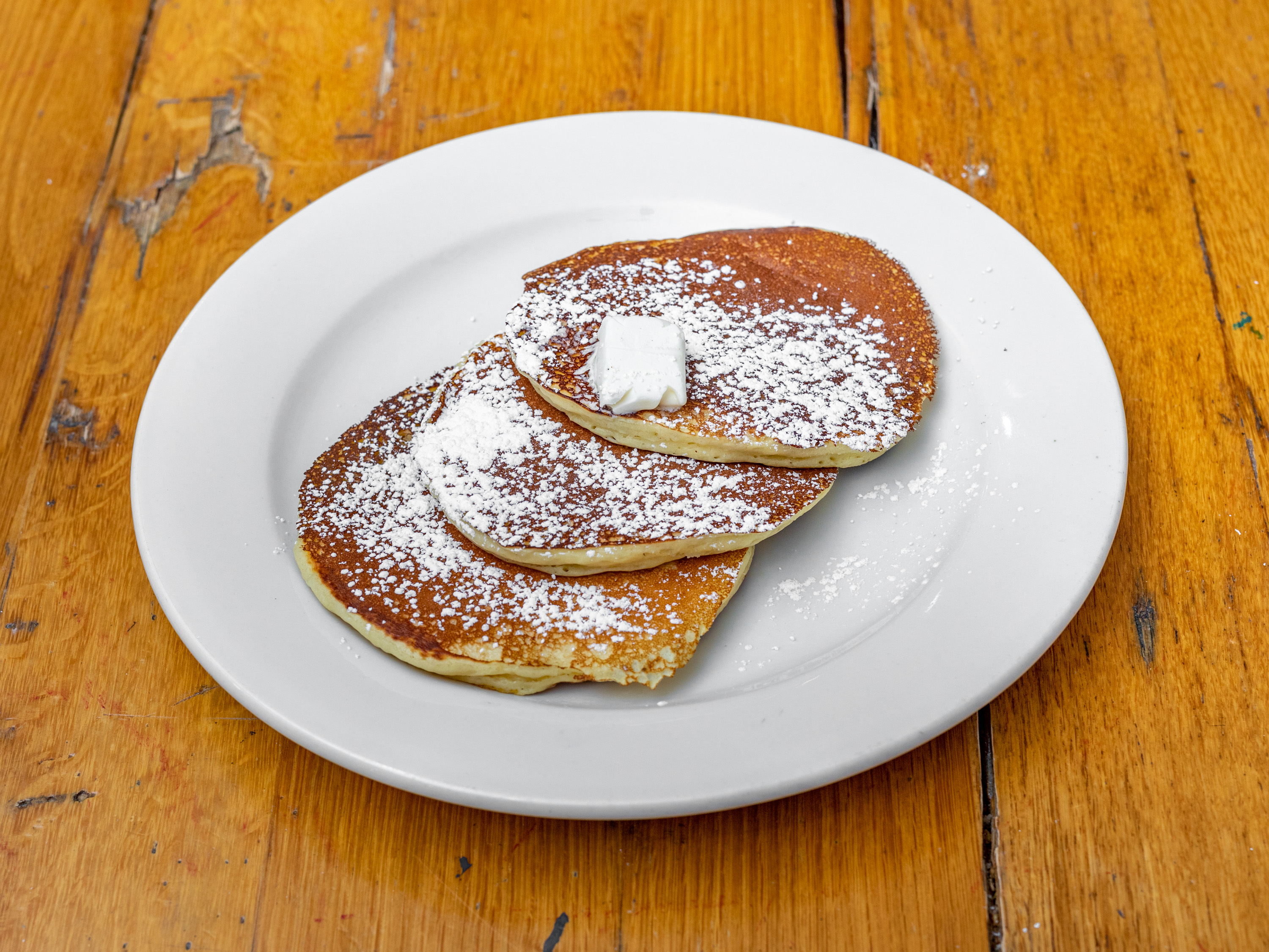 Order PANCAKES food online from Thiago's Restaurant store, Chicago on bringmethat.com