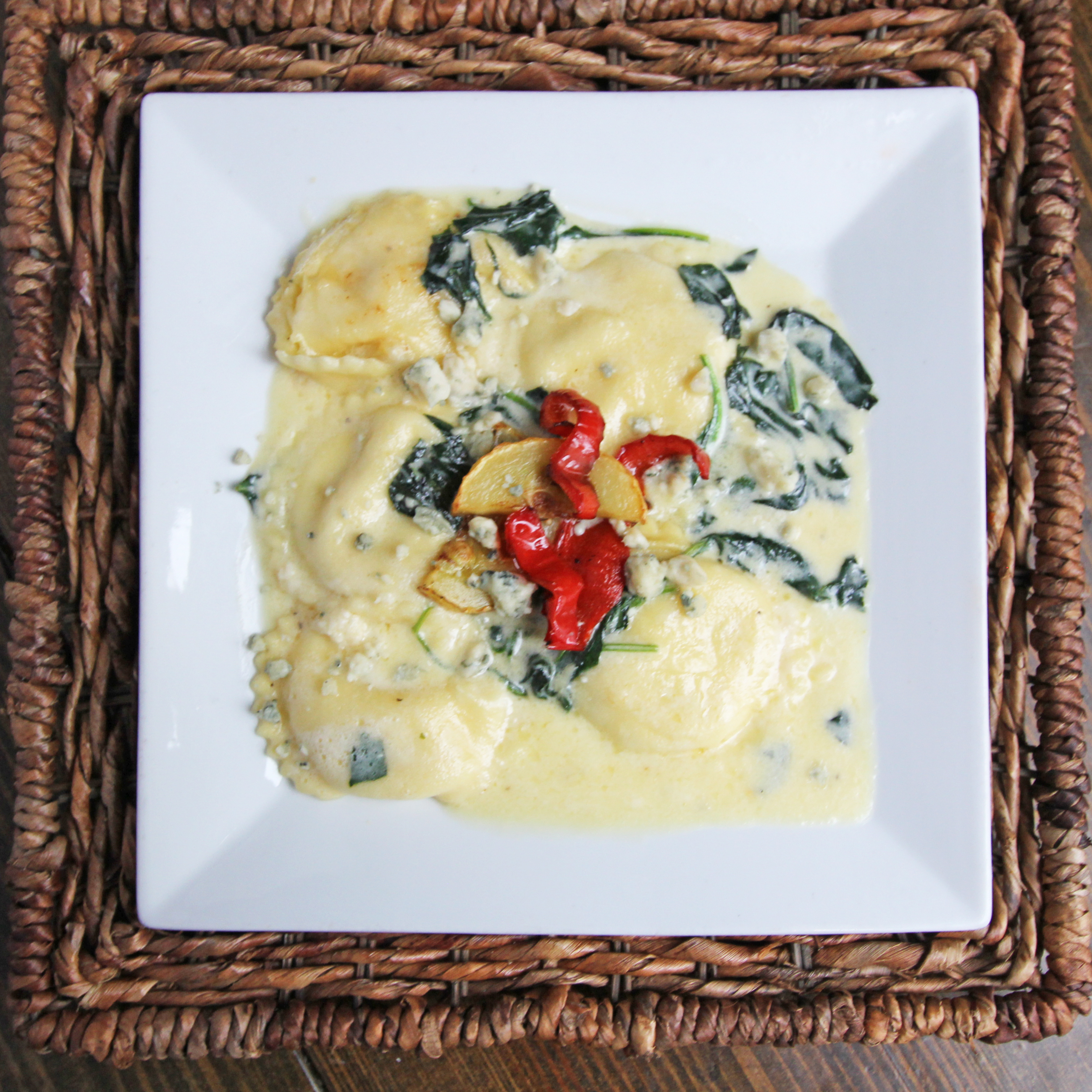 Order 3 Cheese and Spinach Ravioli food online from The Big Easy store, Raleigh on bringmethat.com