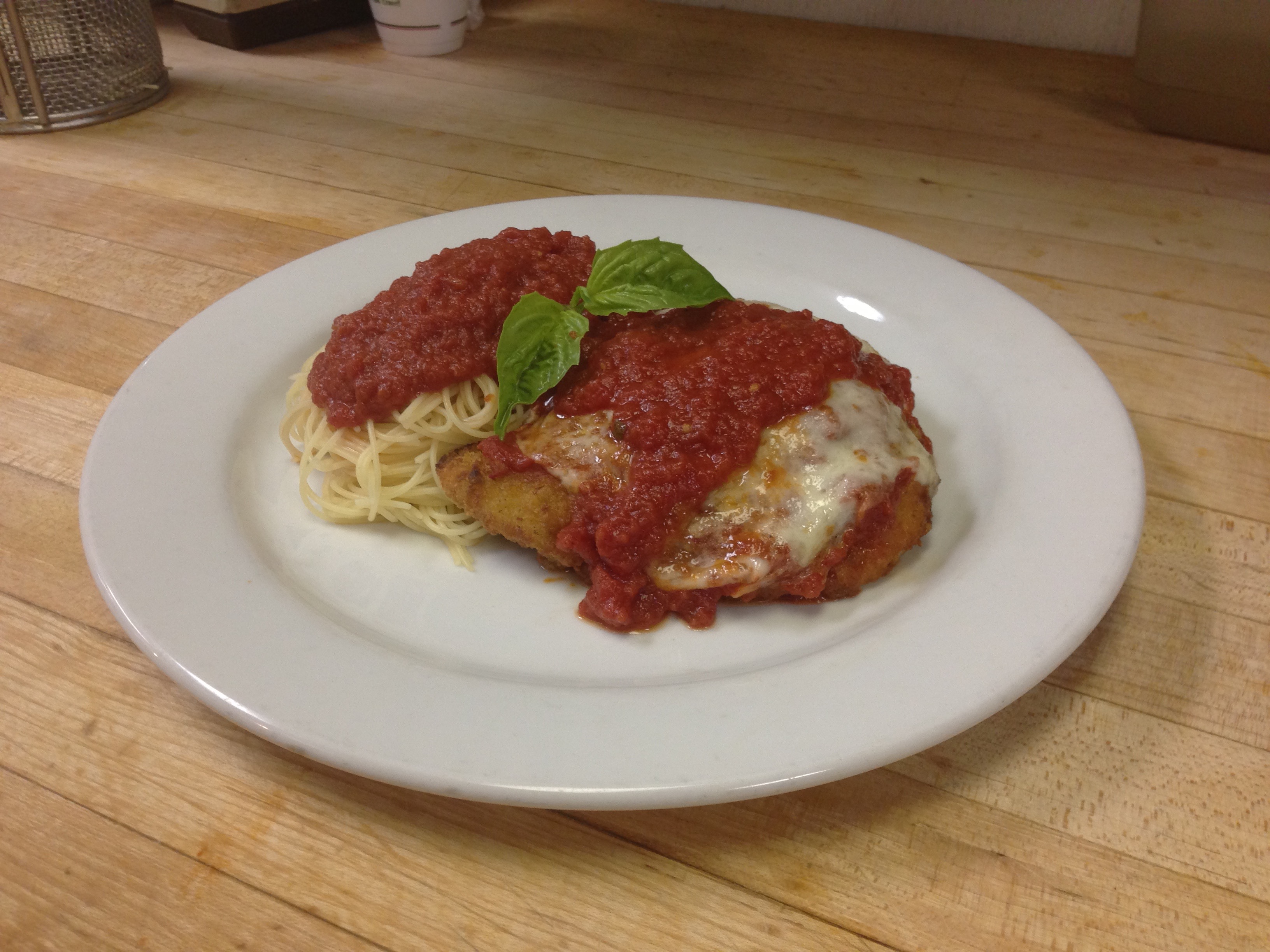 Order Chicken Parmigiana food online from Cuzino Pizza & Pasta store, North East on bringmethat.com