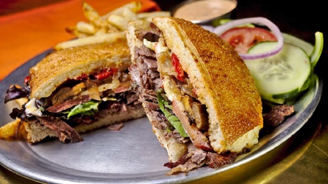 Order Slyce Steak Sandwich food online from HOMESlyce Pizza Bar store, Baltimore on bringmethat.com