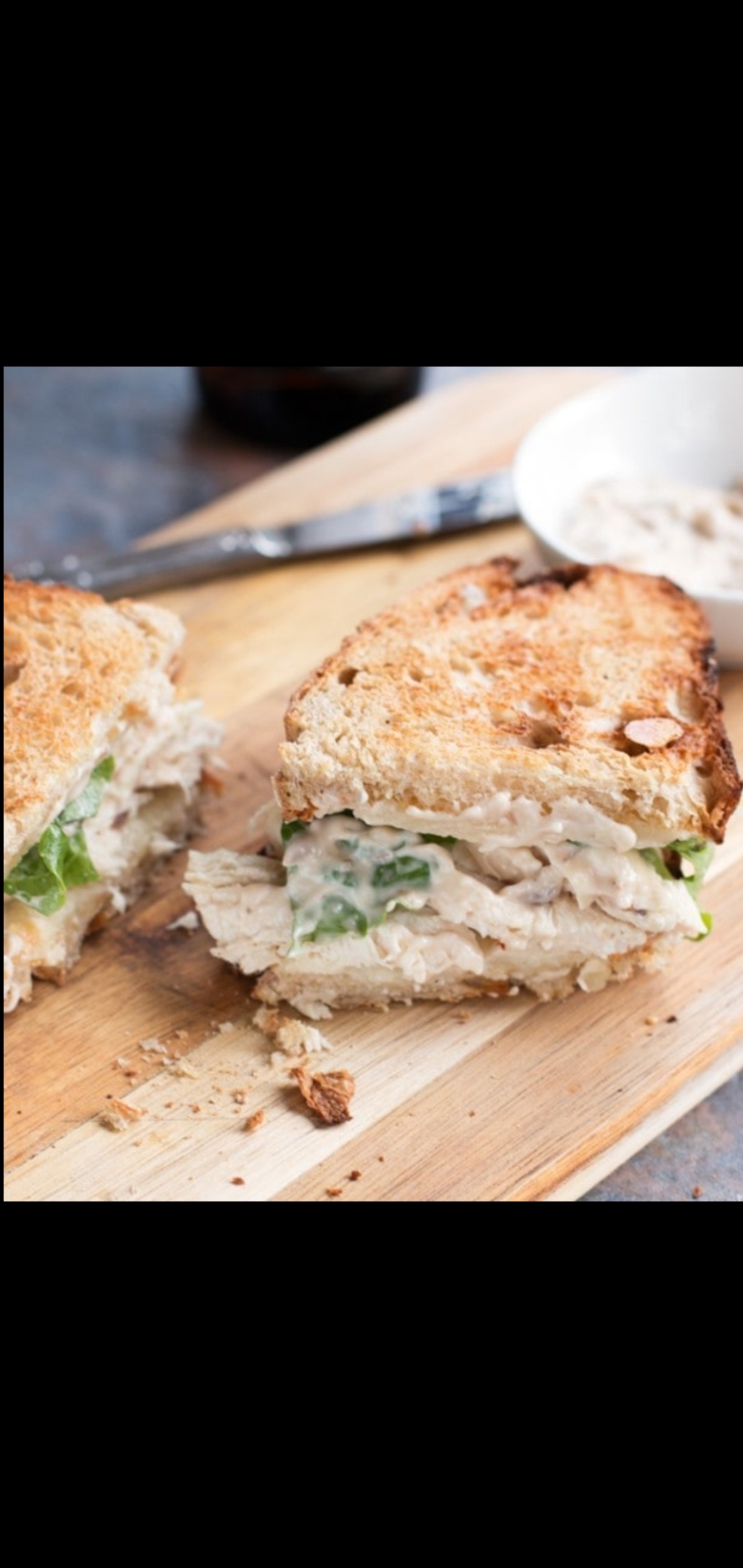 Order Caesar Chicken Signature Sandwich(grilled chicken parmesan cheese romaine lettuce & Caesar dressing) food online from American Gourmet Foods Deli store, New York on bringmethat.com