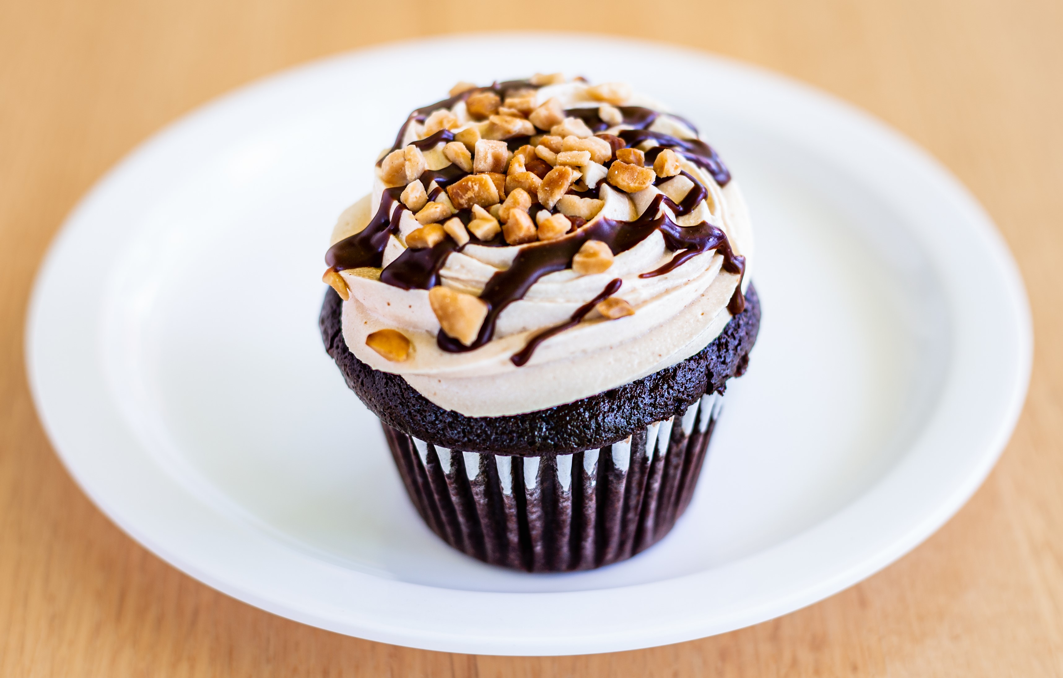 Order Chocolate Peanut Butter Cupcake food online from Courageous Bakery & Cafe store, Oak Park on bringmethat.com