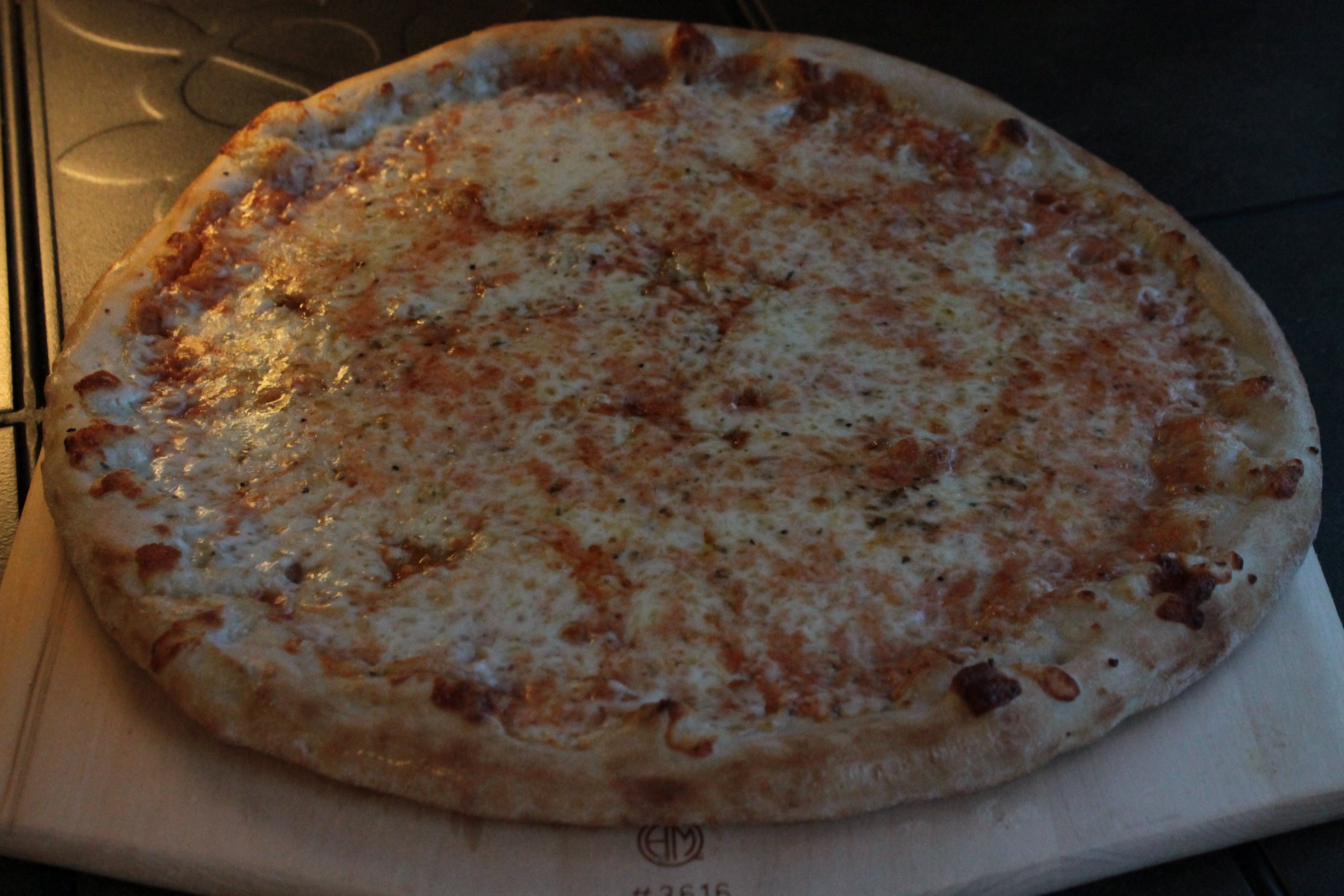 Order The New Yorker Pizza - Medium 14" food online from The Dough Boy's Pizzeria store, Baldwinsville on bringmethat.com