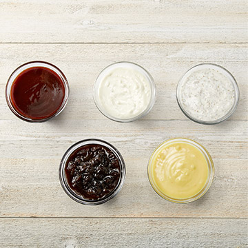 Order Choice Of Sauce (4 Oz) food online from Tgi Fridays store, Madison on bringmethat.com