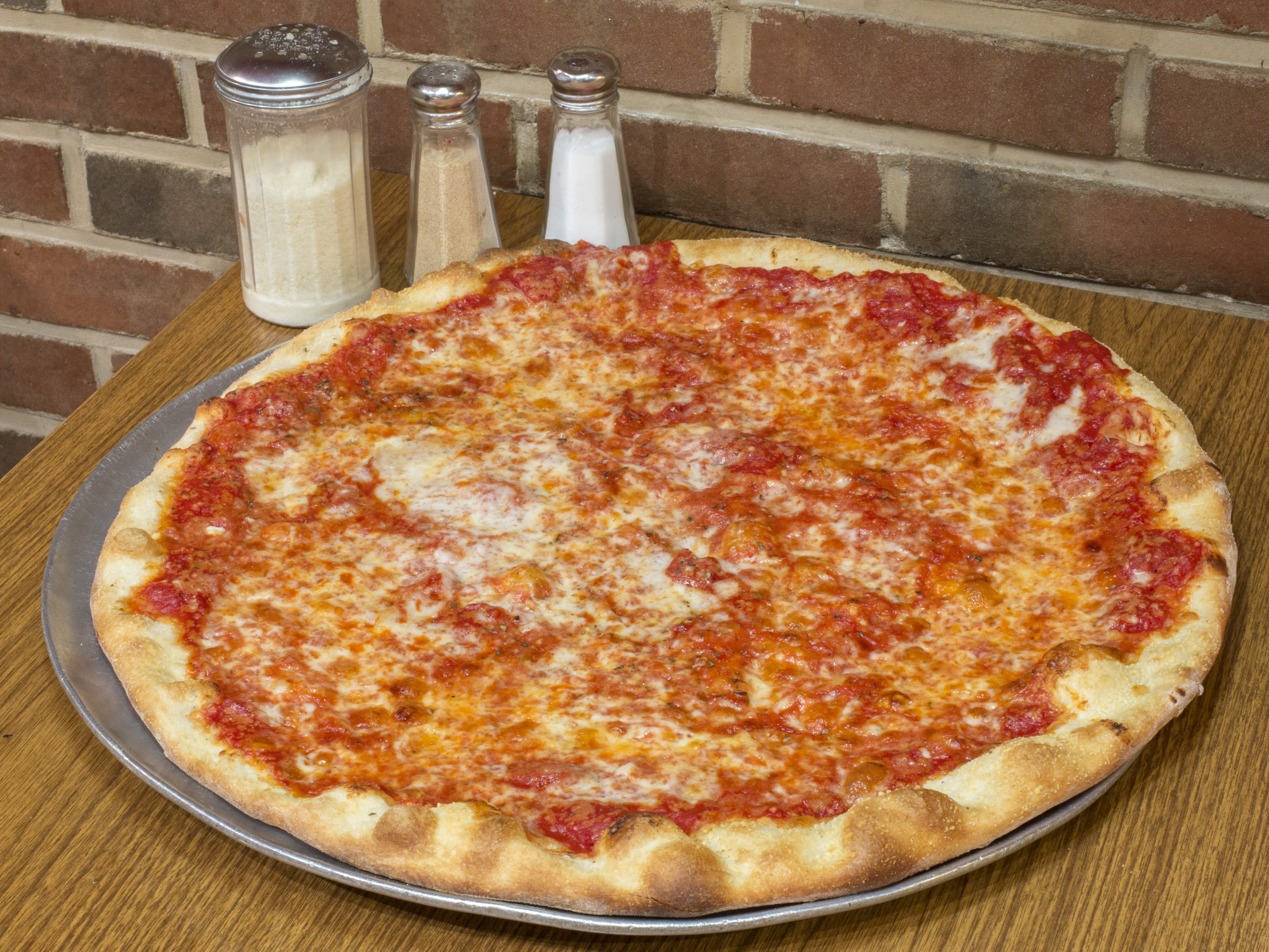 Order NYC Round Cheese Pizza food online from Ny pizza suprema store, New York on bringmethat.com