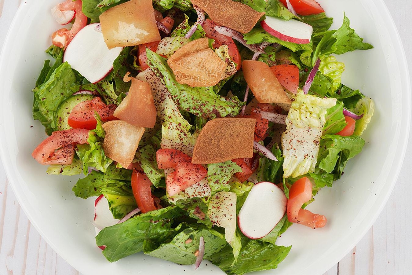 Order Fattoush food online from Tarme Mediterranean Grill store, Glendale on bringmethat.com