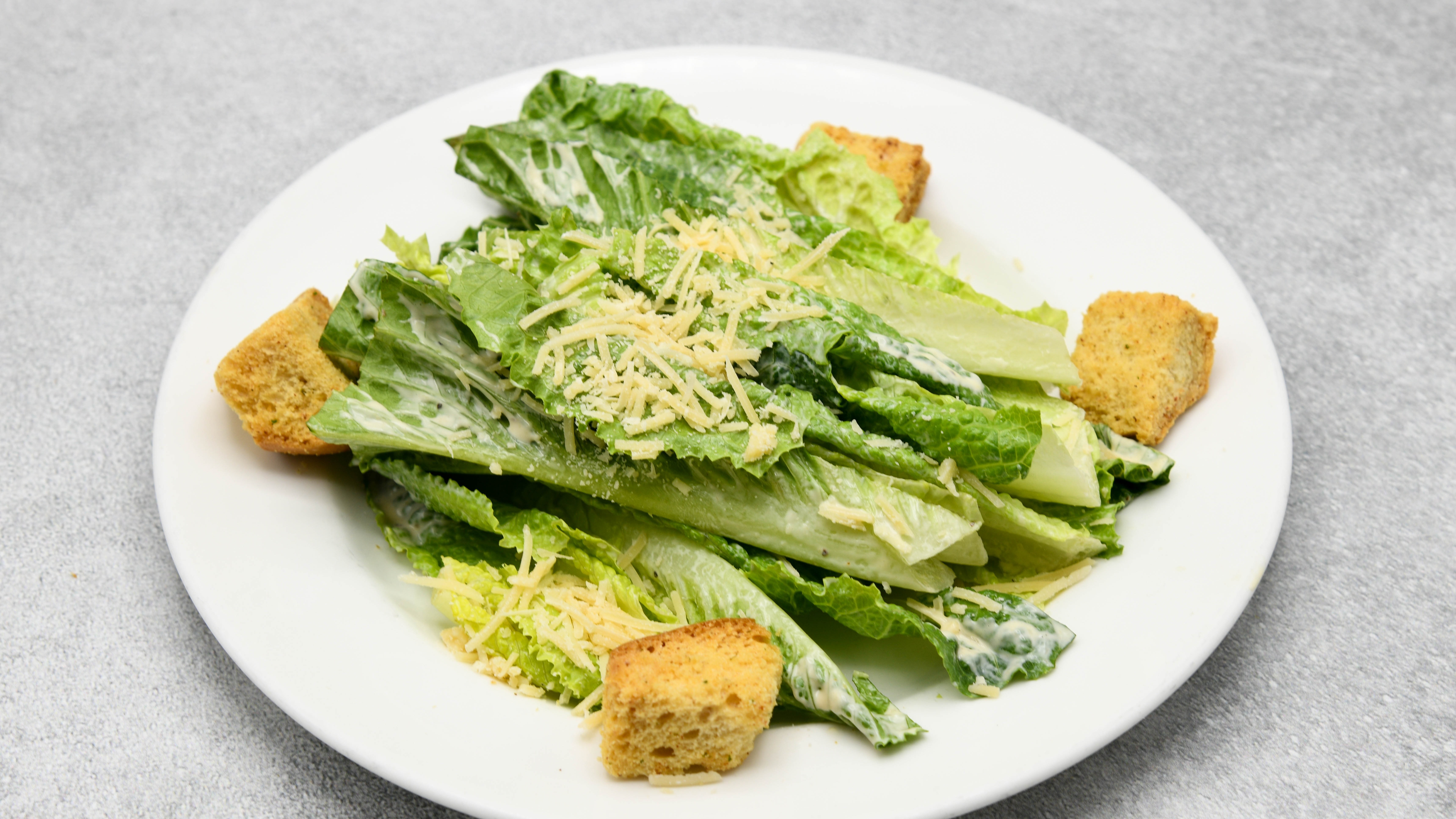 Order Classic Caesar Salad food online from Del Frisco's store, Houston on bringmethat.com