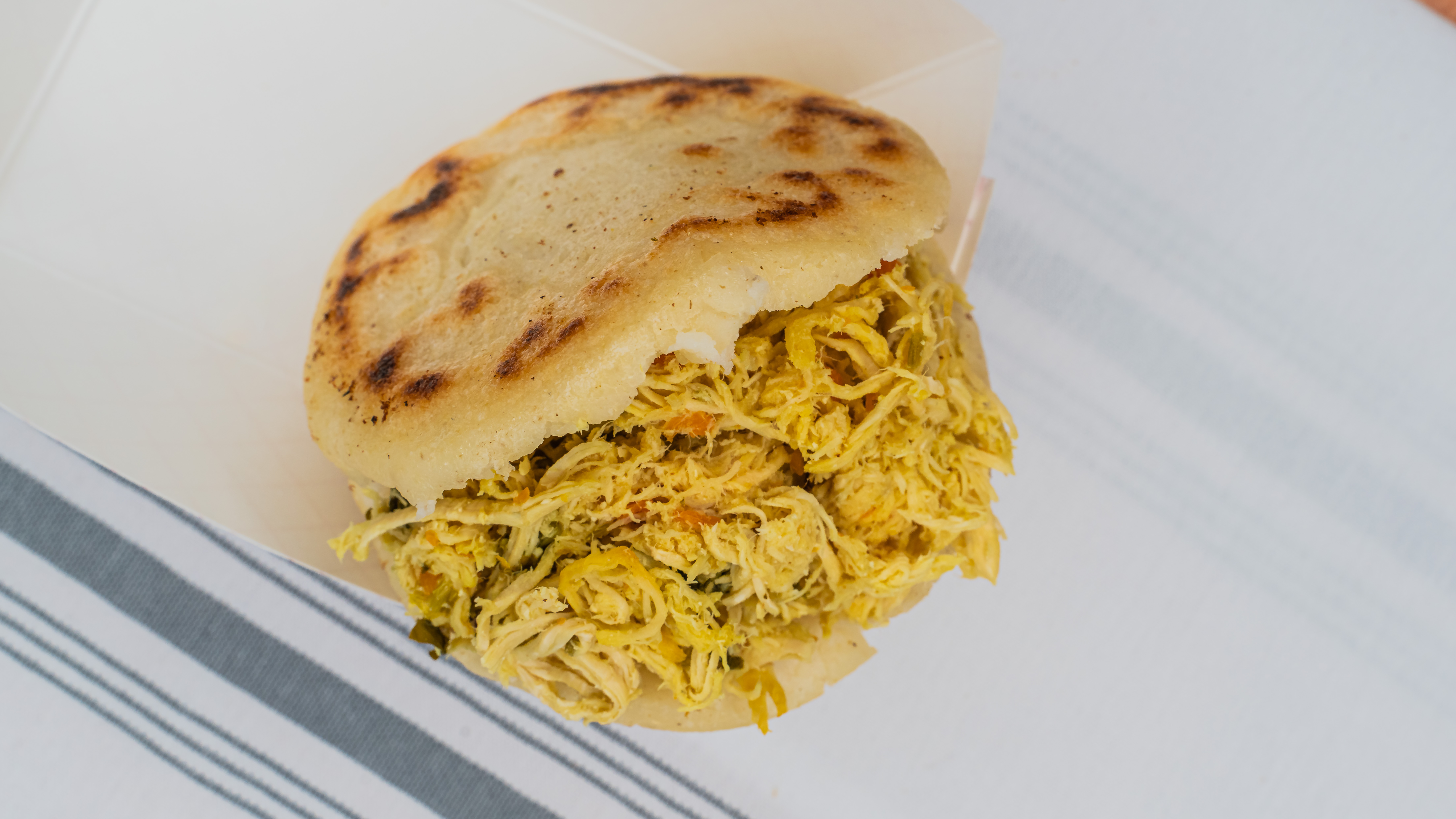 Order Chicken Arepa food online from Cacho Bistro store, Albuquerque on bringmethat.com