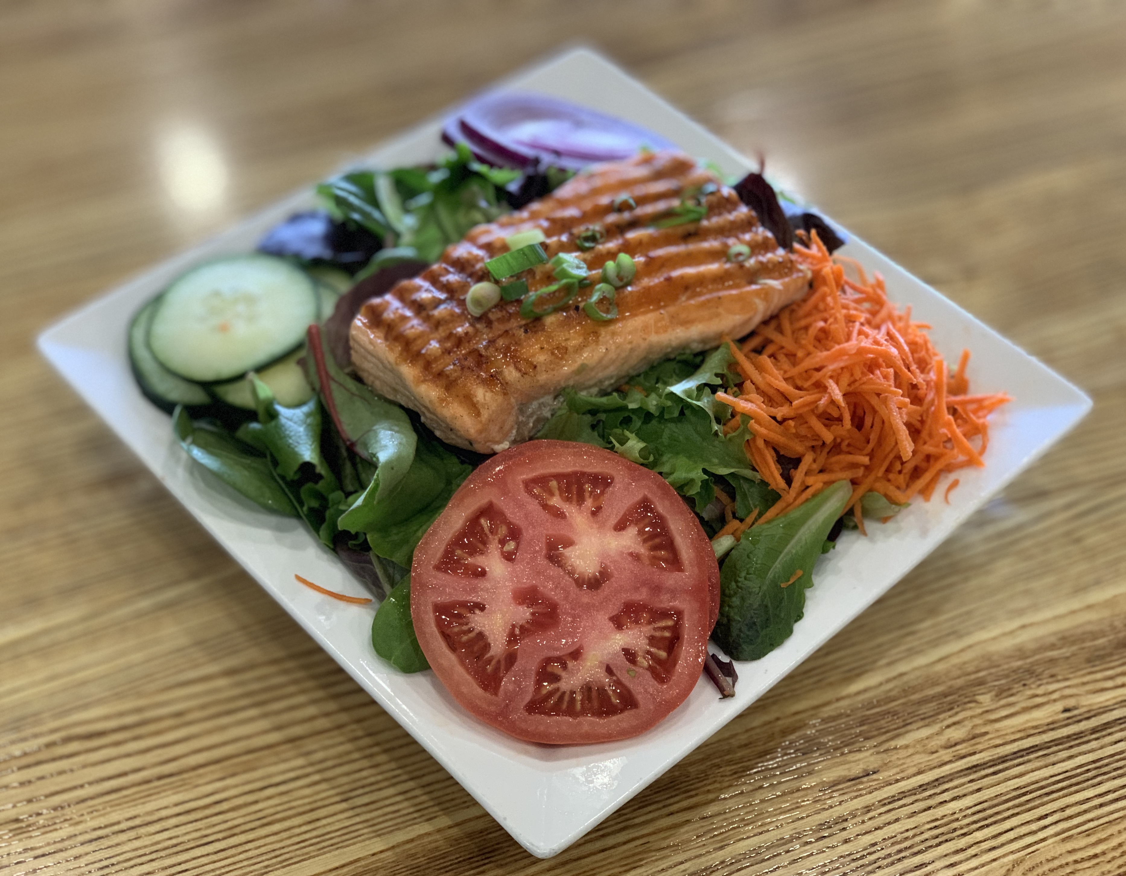Order Grilled Salmon Salad food online from Apple A Day Cafe store, Miami Beach on bringmethat.com
