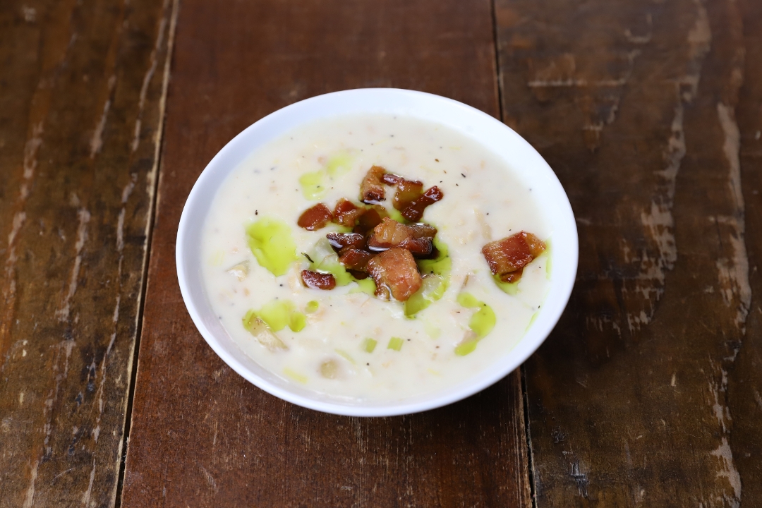 Order New England Clam Chowder Cup food online from Plank Seafood Provisions store, Omaha on bringmethat.com