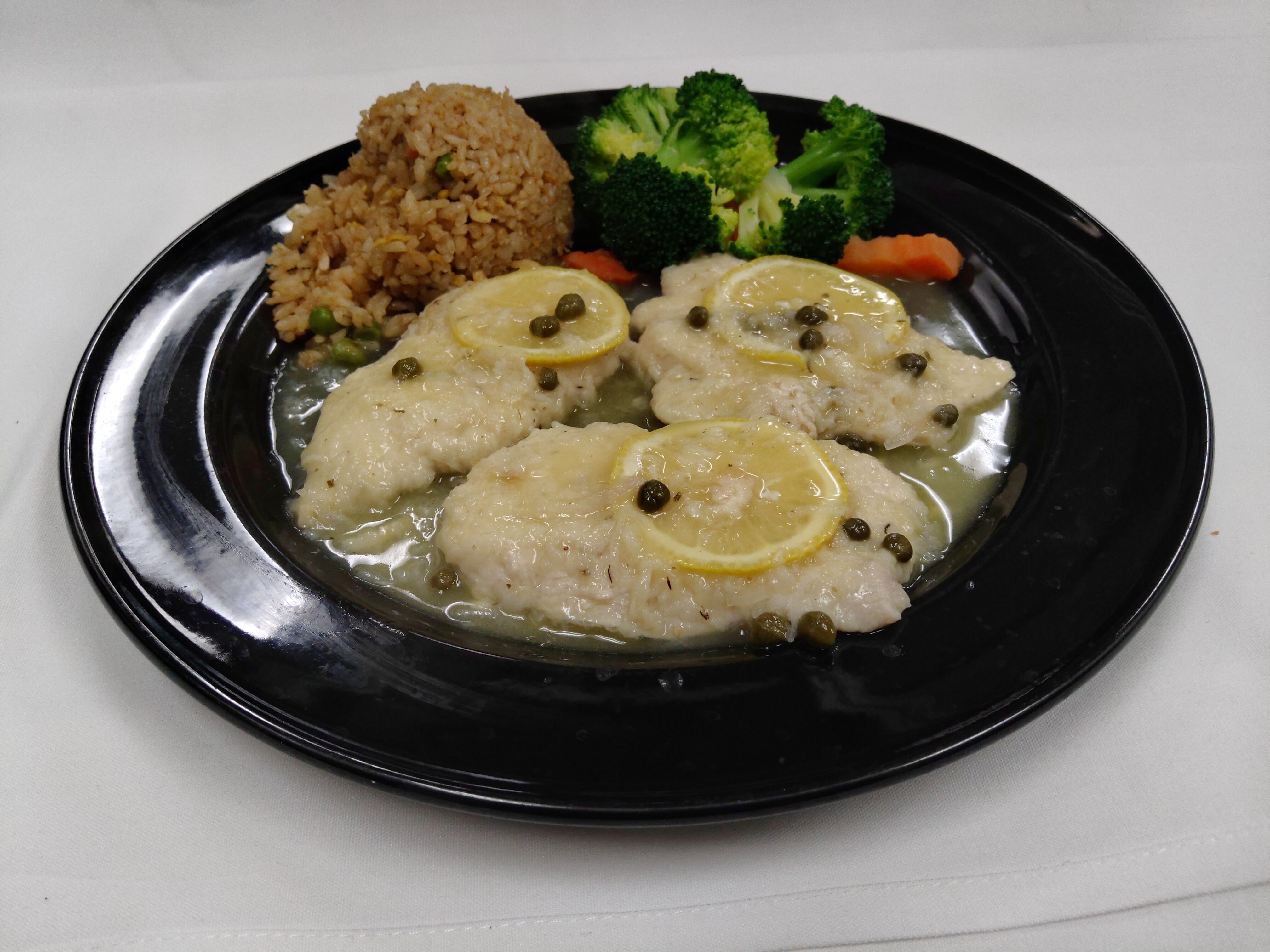 Order 27. Lemon Chicken Piccata food online from Chateau Chang store, Victorville on bringmethat.com