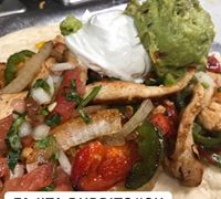 Order Fajita Burrito food online from Los Alcatraces Mexican Restaurant store, Aurora on bringmethat.com