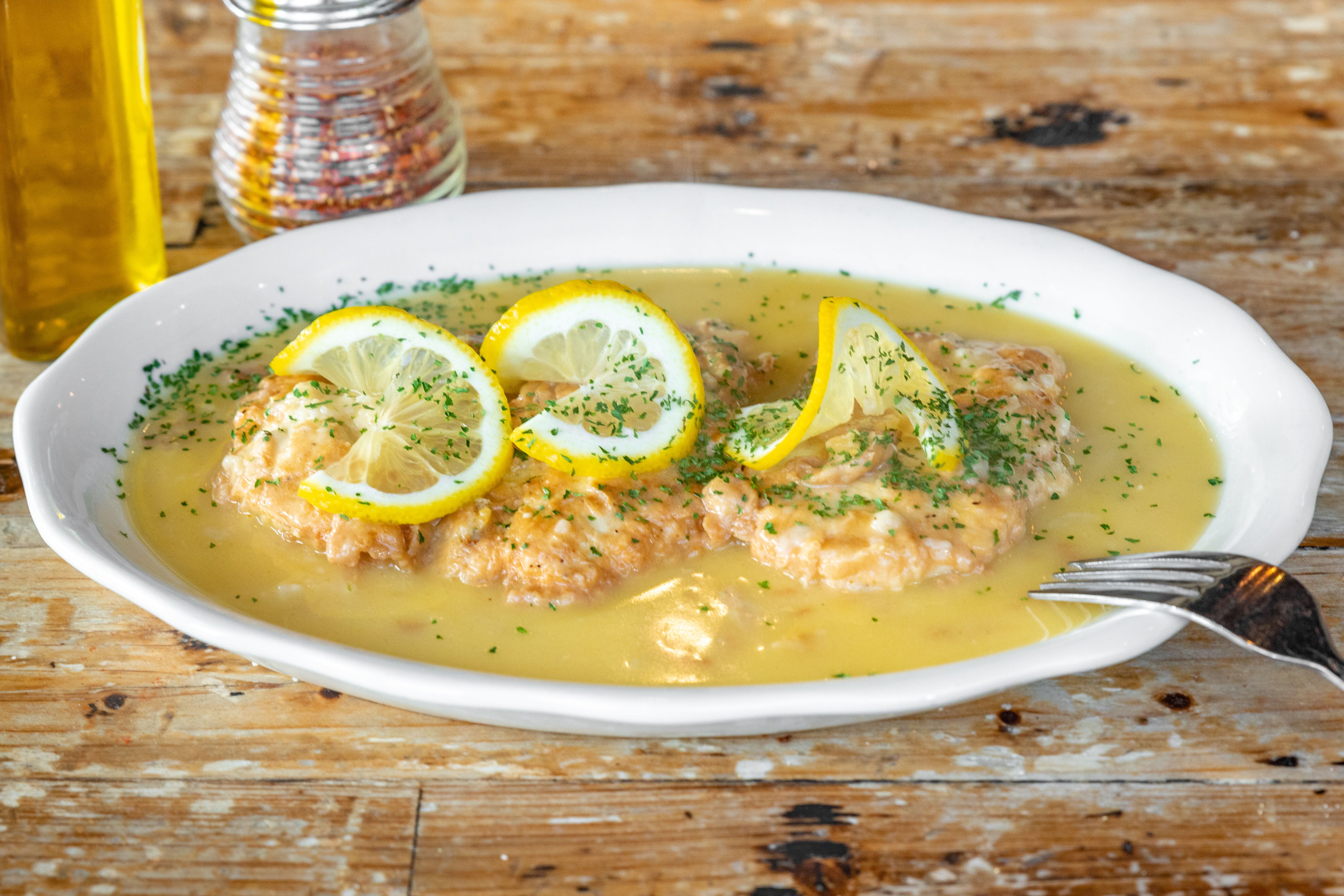 Order Chicken Francese - Entree food online from Trumbull Pizza Co store, Trumbull on bringmethat.com