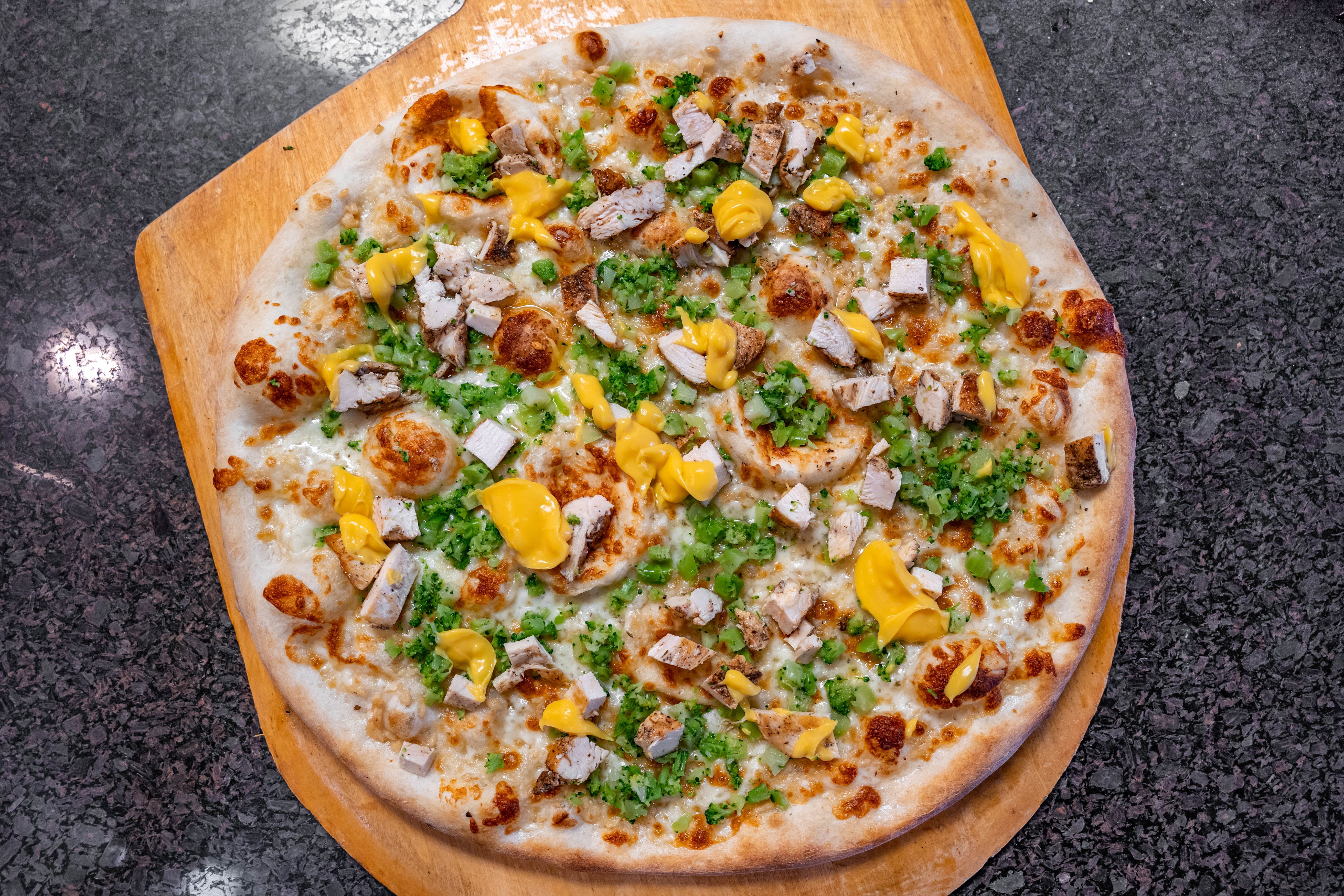 Order Neapolitan  Chicken Broccoli Pizza - Neapolitan food online from Father & Sons store, Woodbury on bringmethat.com