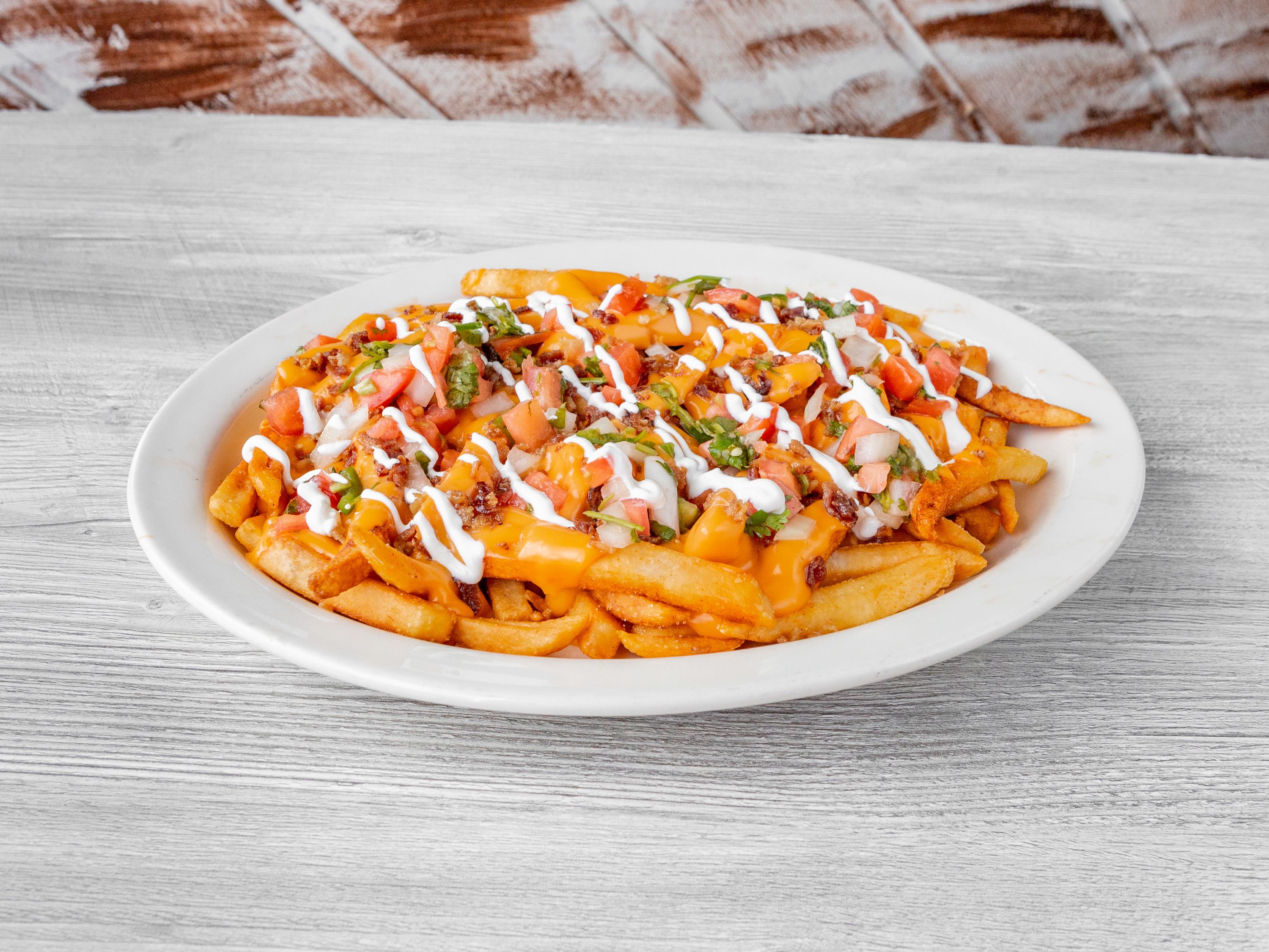 Order Texas Fries food online from Wild West Grill store, Waukegan on bringmethat.com
