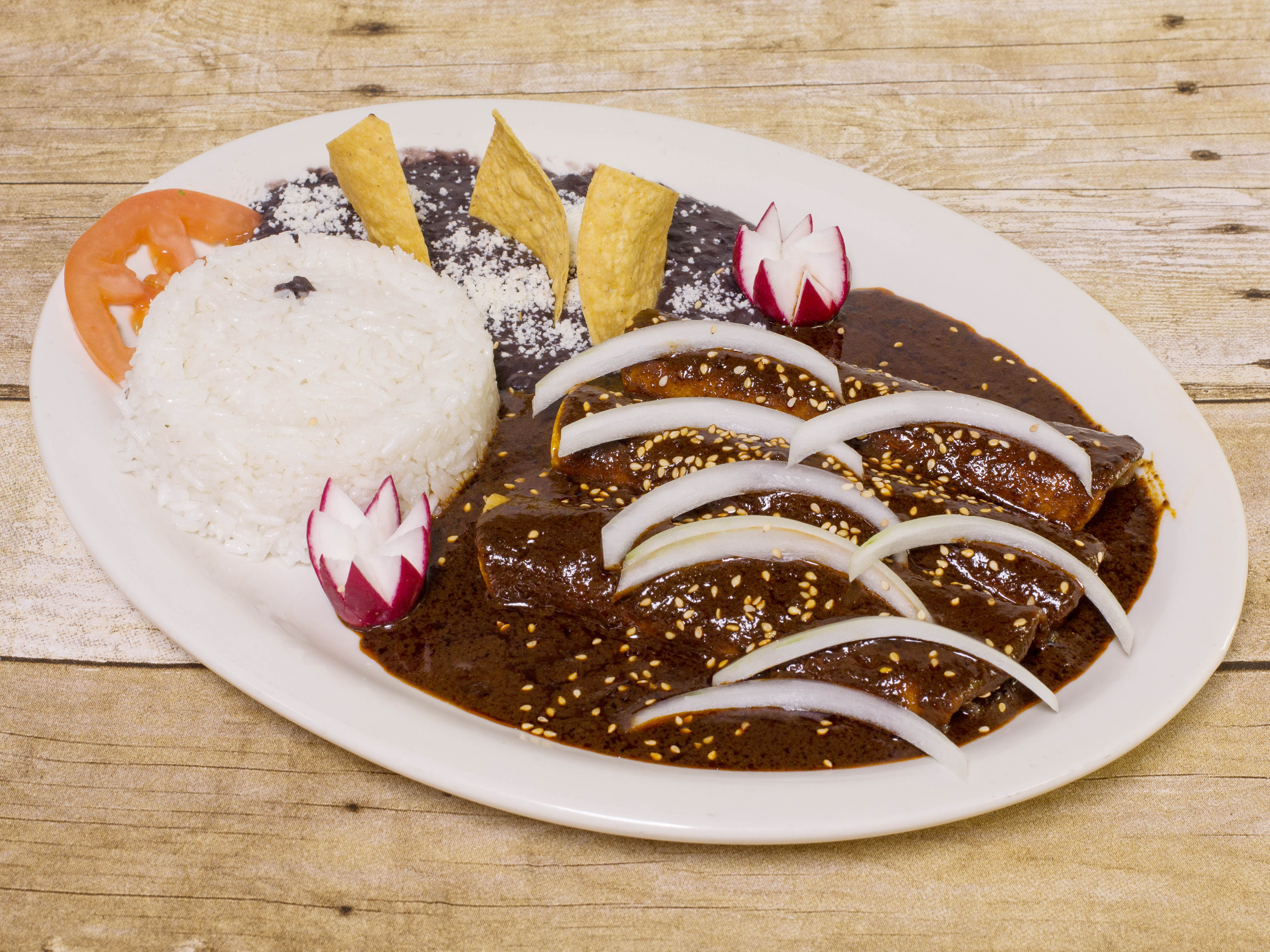 Order 45. Enchiladas con Mole Poblano food online from El Centenario store, Irvington on bringmethat.com