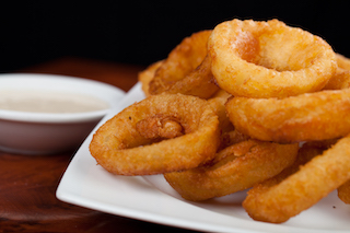 Order Beer-Battered Onion Rings food online from Silver Spoon Diner store, Queens on bringmethat.com