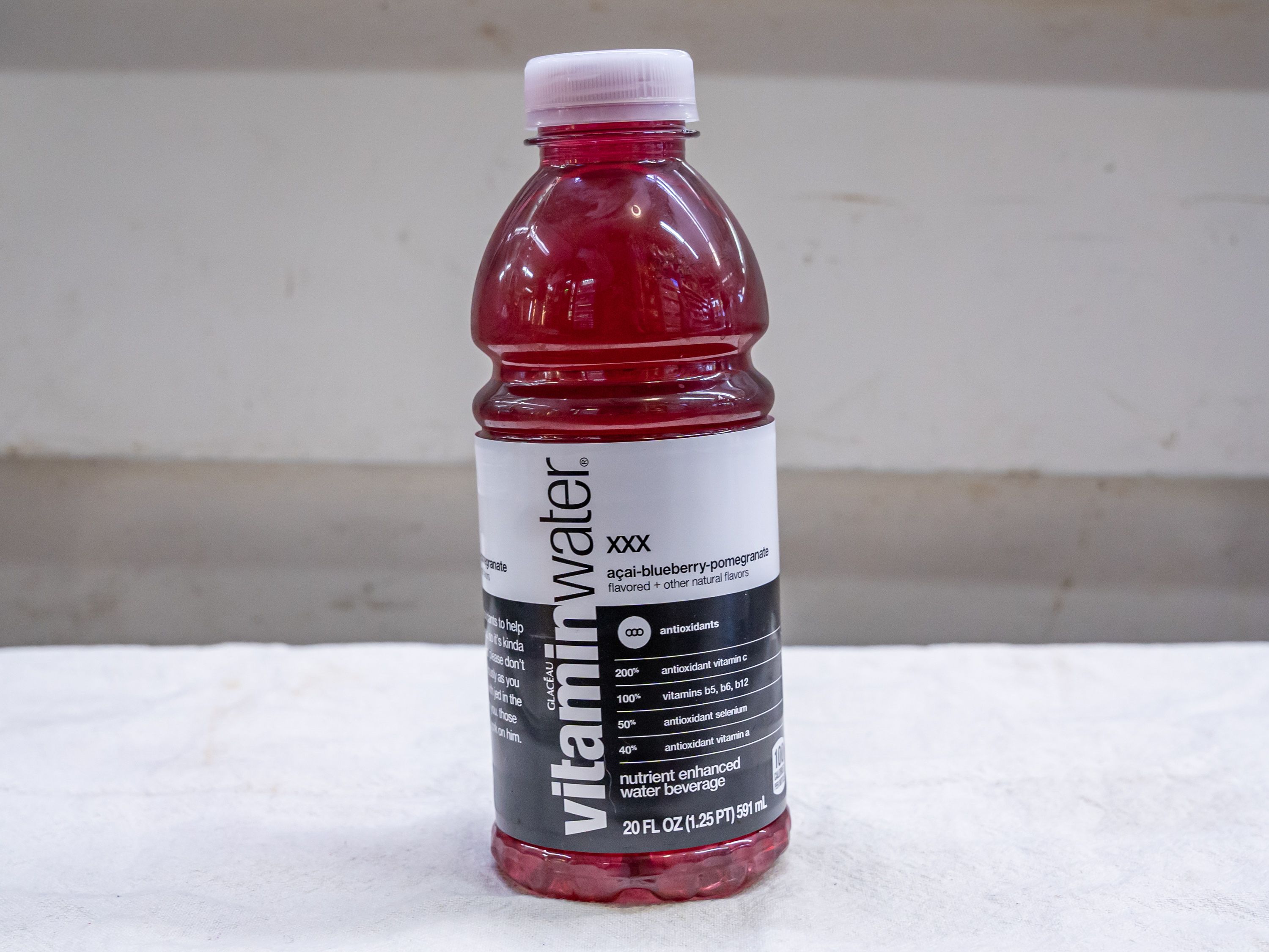 Order Vitamin water XXX - 20fl oz food online from Quentin Deli and Grocery store, Brooklyn on bringmethat.com