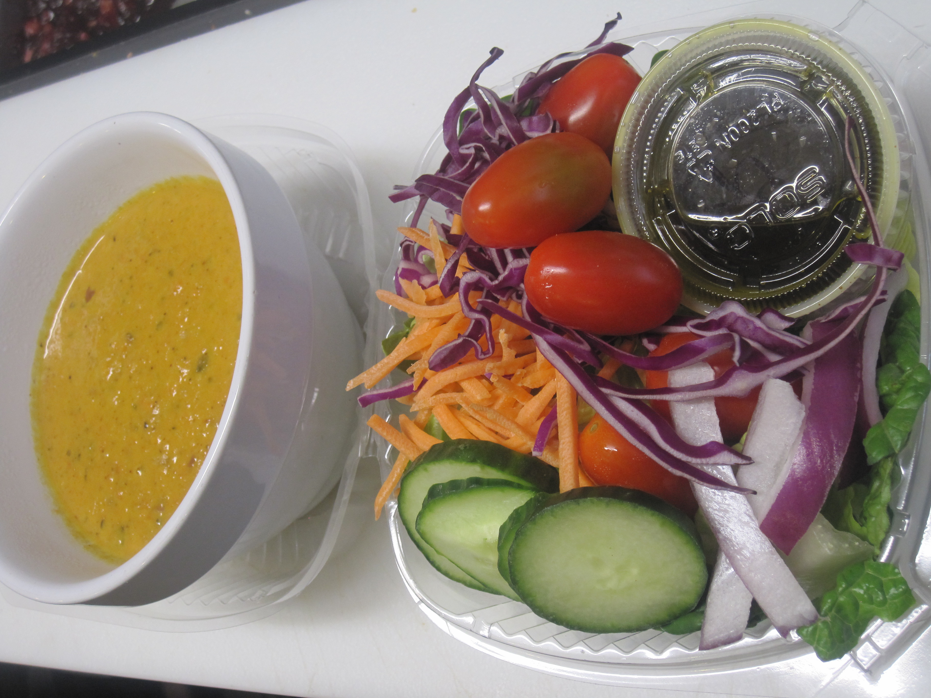 Order 1/2 Green Salad and Cup Soup food online from La Bakery store, Carson City on bringmethat.com