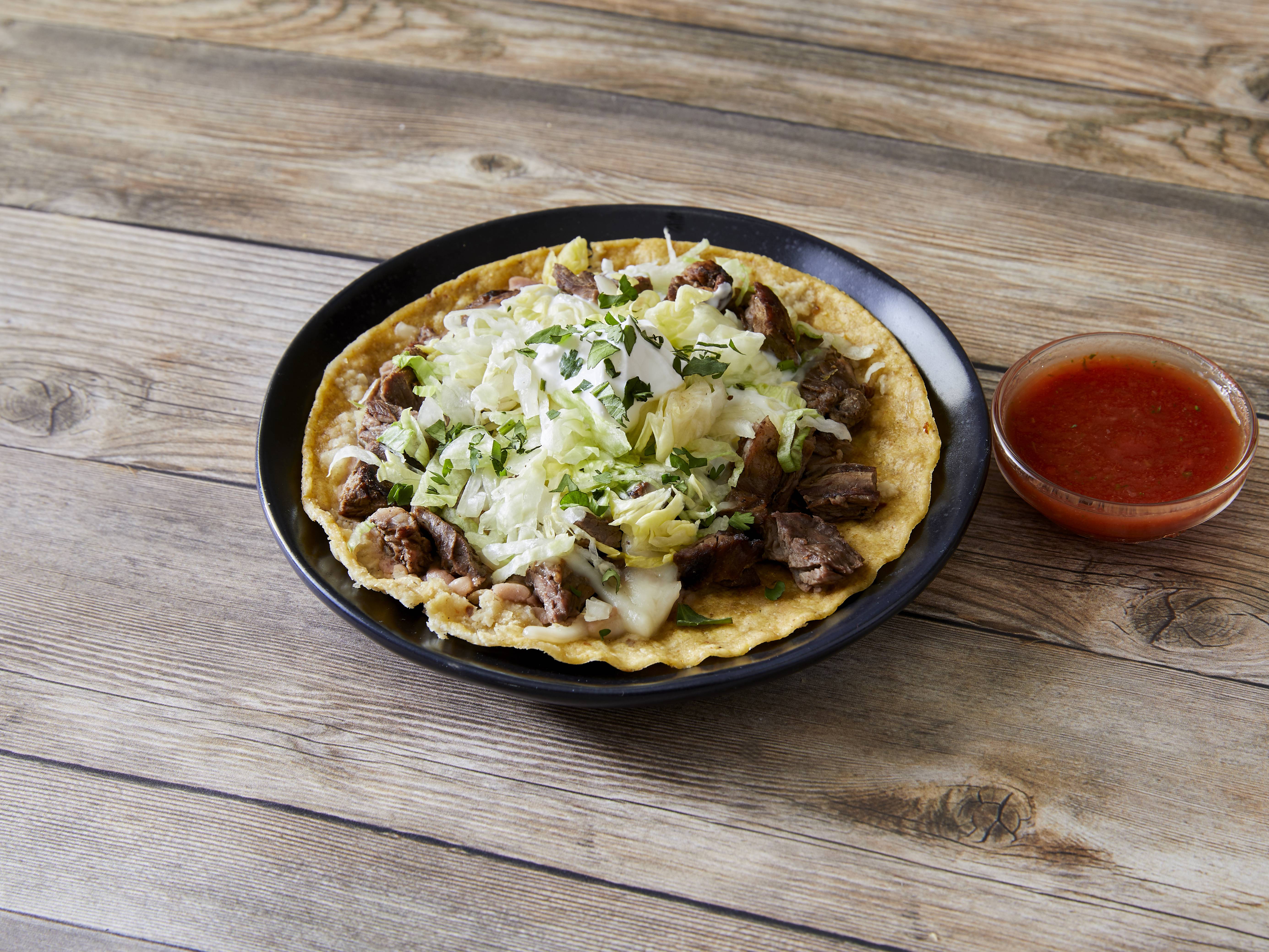 Order Steak Tostada food online from Los Azares Mexican Grill store, Chicago on bringmethat.com