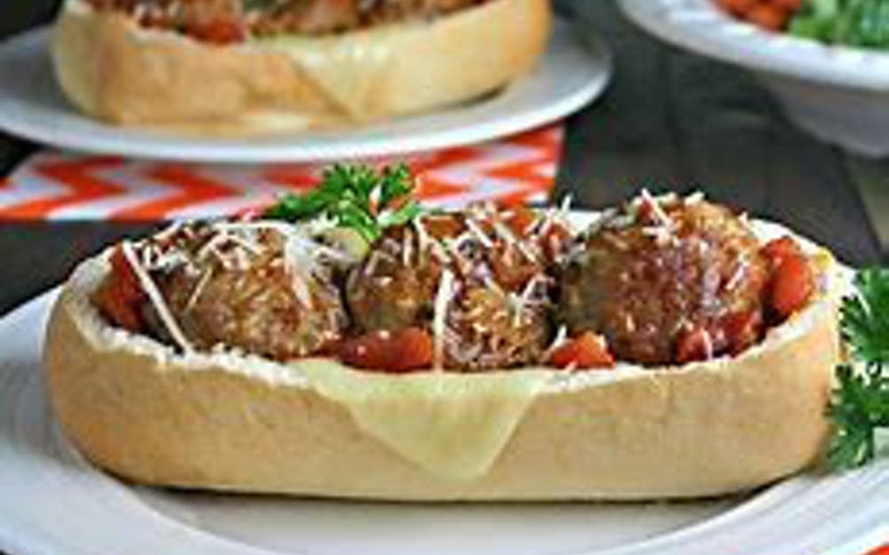 Order Meatball Sub - 7" food online from Pino's Pizzeria store, Easton on bringmethat.com