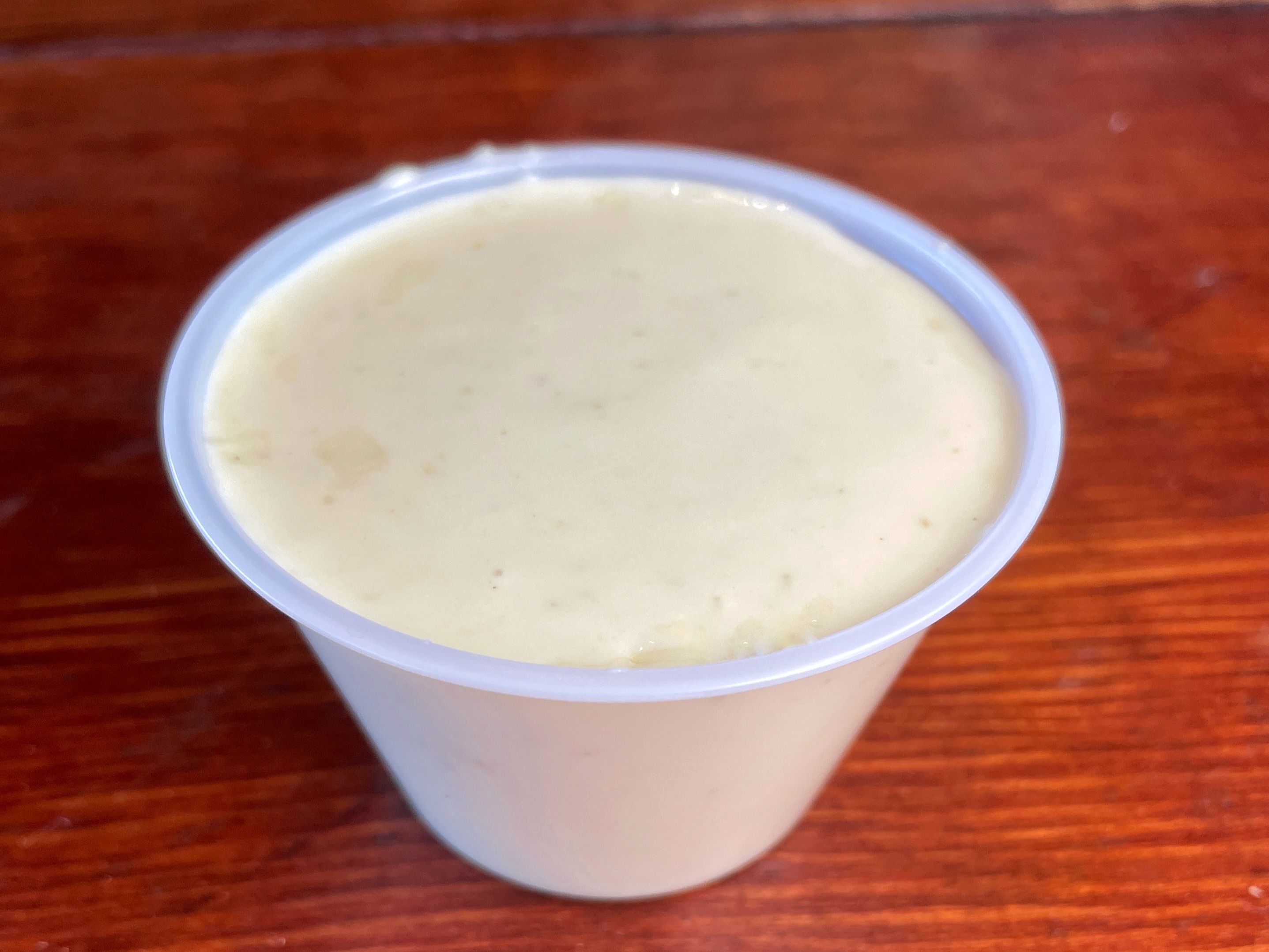Order Queso 4oz food online from Right Coast Taqueria store, Deer Park on bringmethat.com