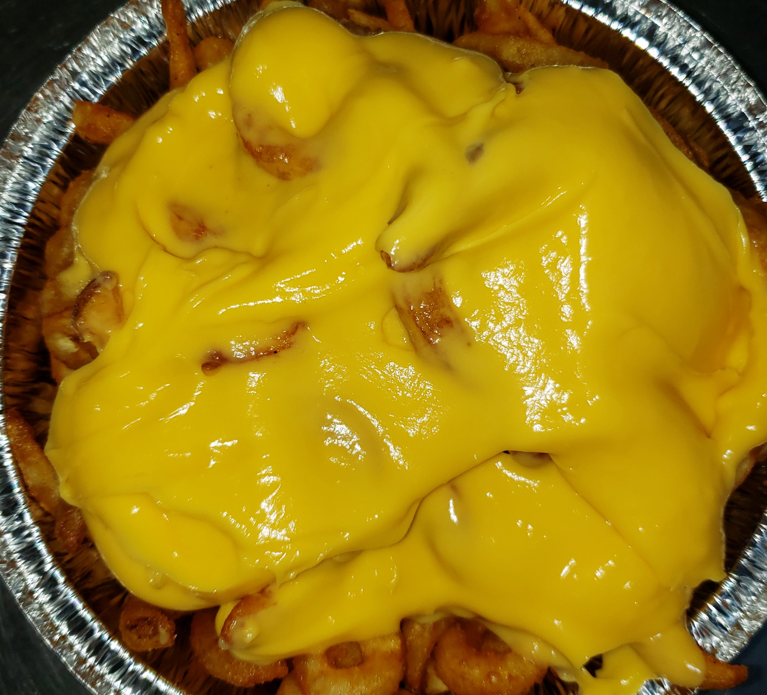 Order Curly Fries with Nacho Cheese food online from Pizza Mart store, Baltimore on bringmethat.com