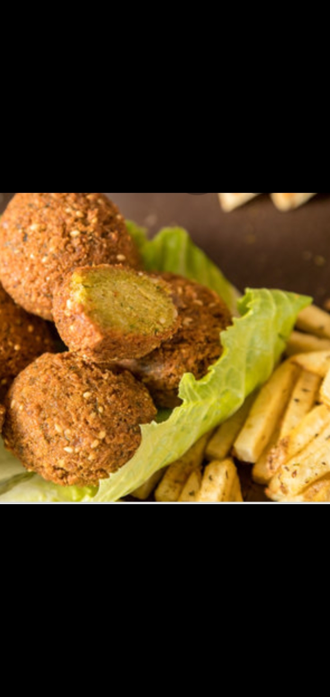 Order  Falafel And Fries Or Potato Wedges  food online from American Gourmet Foods Deli store, New York on bringmethat.com