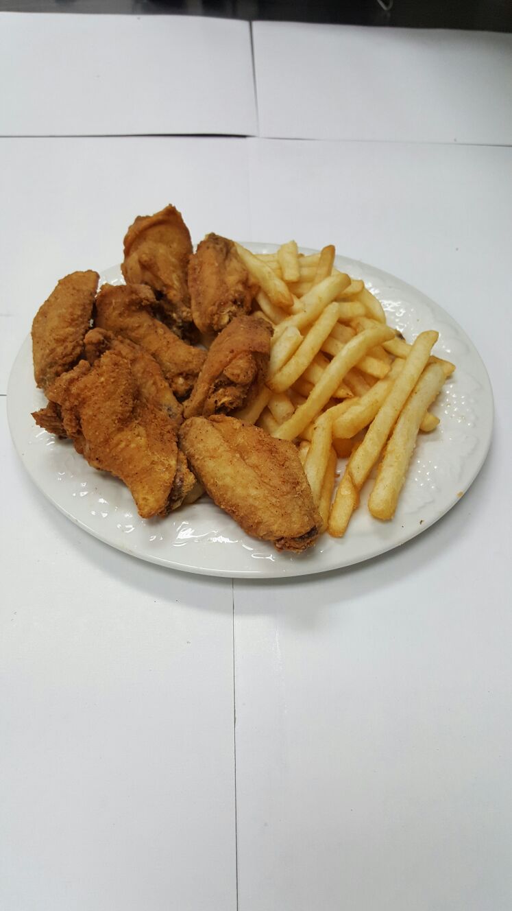 Order 10 Piece Wing Dings, Fries, Bread and Coleslaw Daily Special food online from Pizza & Fish Express store, Detroit on bringmethat.com