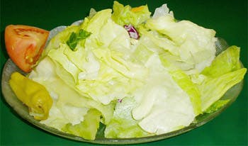 Order Tossed Garden Salad - Salad food online from Primas Pasta & Pizza Restaurant store, Fort Worth on bringmethat.com