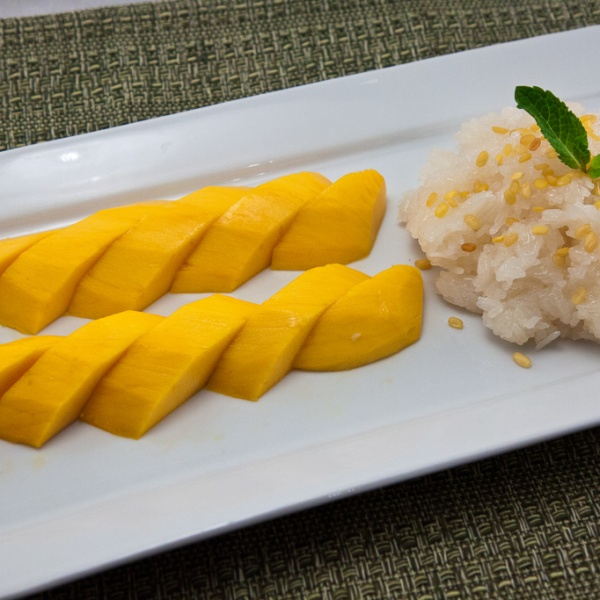 Order Mango with Sticky Rice food online from Issara Thai Cuisine store, Huntington Beach on bringmethat.com