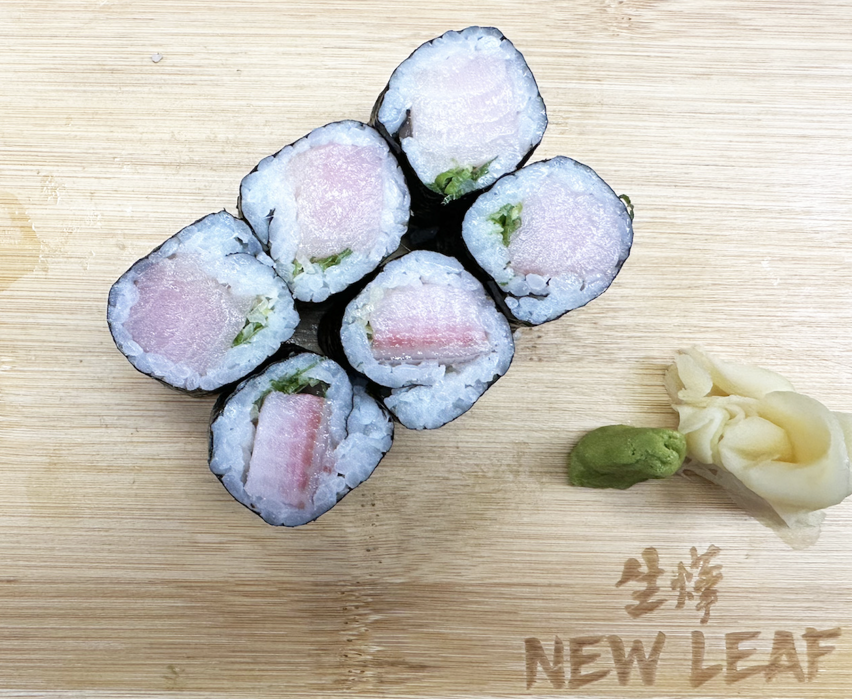 Order Yellow Tail Scallion Roll food online from New Leaf Chinese & Japanese Cuisine store, Philadelphia on bringmethat.com