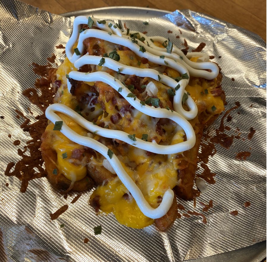 Order Loaded Potato Wedges - Appetizer food online from Big D Pizza store, Clyde on bringmethat.com
