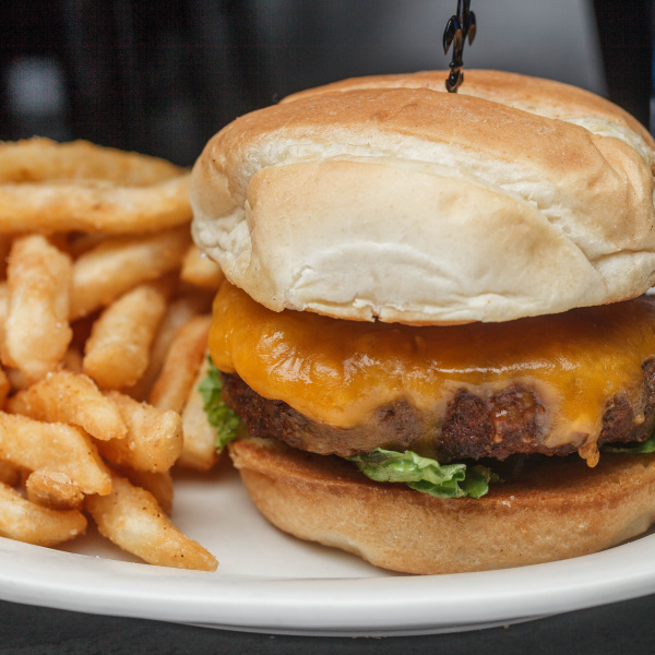 Order The Deluxe Cheese Burger food online from Oceana Grill store, New Orleans on bringmethat.com